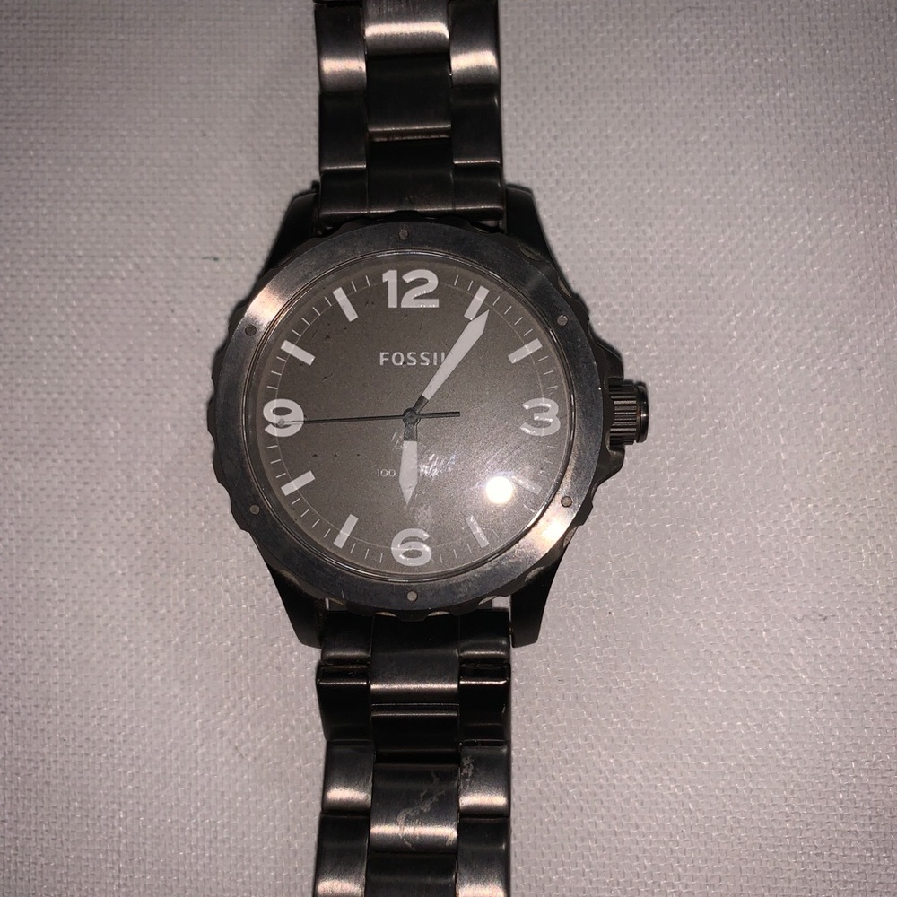 Fossil watch used to work batteries must be dead one owner